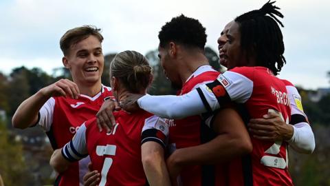 Exeter City players celebrate