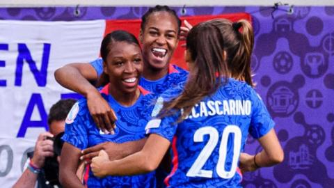 France celebrate scoring against Italy