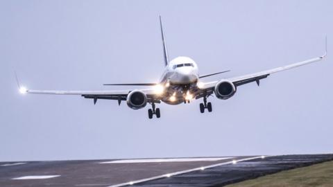 Plane landing at Leeds Bradford Airport