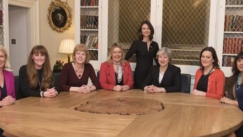 Theresa May with a number of female MPs appointed as whips