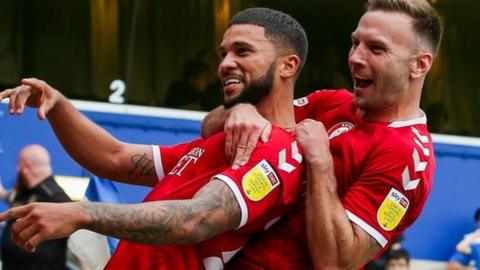 Nahki Wells celebrates with Andreas Weimann of Bristol City