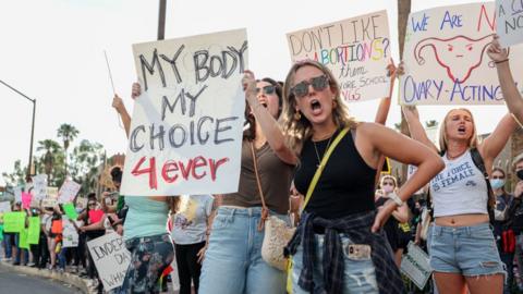 Abortion rights protesters chant during a Pro Choice rally at the Tucson Federal Courthouse in Tucson, Arizona on Monday, July 4, 2022.