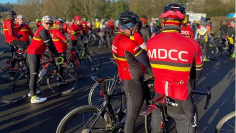 Cyclists at funeral of Ken Robertson