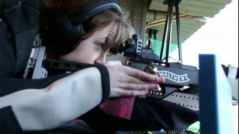 BBC Young Reporter Elsa practising shooting