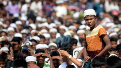 Rohingya refugees attend a ceremony organised to remember the second anniversary of a military crackdown that prompted a massive exodus of people from Myanmar to Bangladesh, at the Kutupalong refugee camp in Ukhia on August 25, 2019.