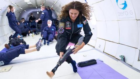 Mary Cooper removing her prosthetic leg while floating in zero-gravity