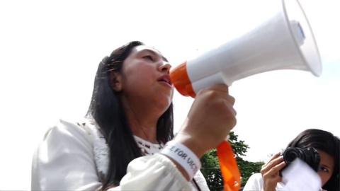 Protester holding a megaphone