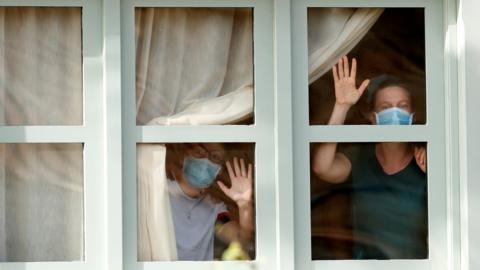 People look out of the window at H10 Costa Adeje Palace