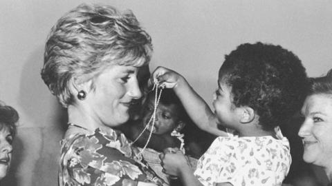 Princess Diana with an HIV positive child in Brazil in 1991