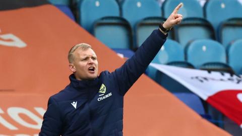 Oxford United head coach Liam Manning says Oxford United are starting to look like a team again following Peterborough draw.