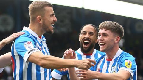 Michal Helik celebrates scoring for Huddersfield