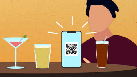 A man using an app to order drinks