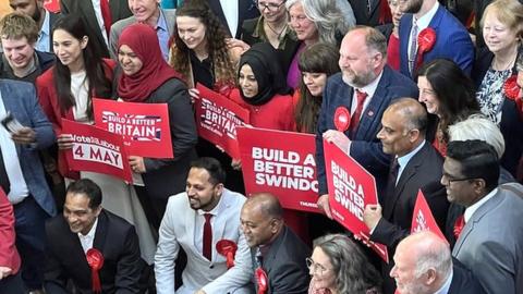 Labour councillors and supporters celebrate their win in Swindon