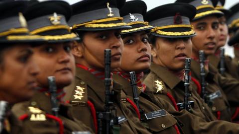 Women officer contingent of the Indian Army march during the Army Day parade at Delhi Cantt on January 15, 2015 in New Delhi.