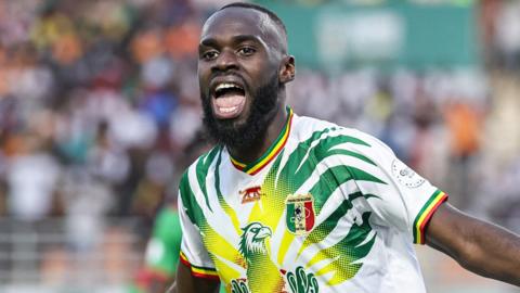 Lassine Sinayoko celebrates a goal for Mali against Burkina Faso at the 2023 Africa Cup of Nations