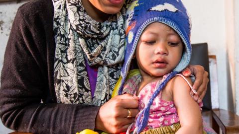 Child being vaccinated