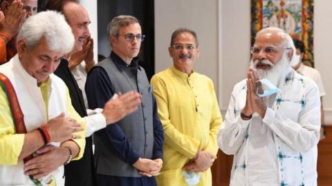 A handout photo made available by the Indian Prime Minister"s Office shows Indian Prime Minister Narendra Modi (R ) greeting members of different political parties from Jammu and Kashmir prior to their meeting in New Delhi, India 24 June 2021.