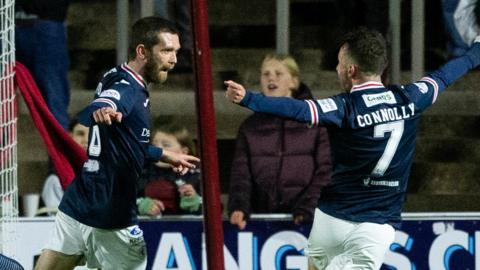 Raith's Sam Stanton (L) celebrates making it 1-0 during a cinch Championship match between Arbroath and Raith Rovers at Gayfield Park