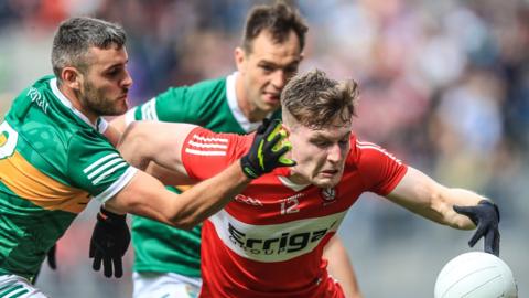 Derry's Ethan Doherty is challenged by Kerry's Graham O'Sullivan