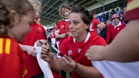 Wales great Sioned Harries signs autographs