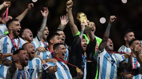 Lionel Messi lifts the World Cup