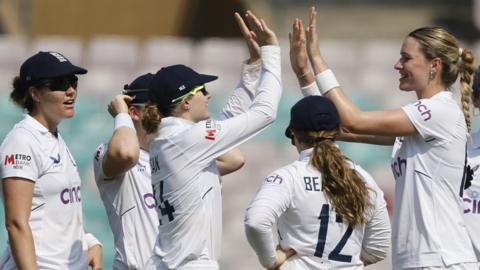 Lauren Bell celebrates a wicket