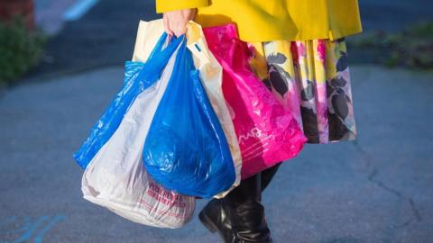 woman with carrier bags