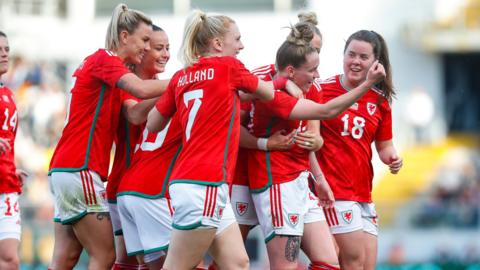 Wales celebrate Rachel Rowe's goal