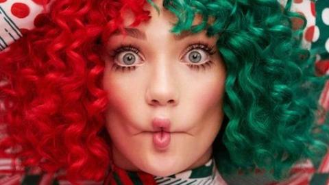 Sia posing for her new Christmas album