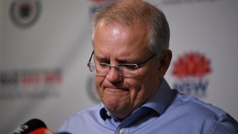 Australian Prime Minister Scott Morrison speaks to the media at the New South Wales Rural Fire Service control room in Sydney, 22 December 2019