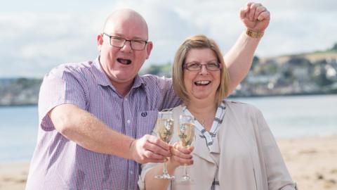 Jim and Pam Forbes celebrating their win