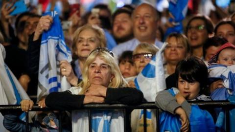 Suporters of National Party presidential candidate Luis Lacalle Pou wait for the results after the second-round presidential election, in Montevideo, Uruguay November 24, 2019.