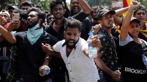 Protest outside the office of Sri Lanka's PM Ranil Wickremesinghe, in Colombo