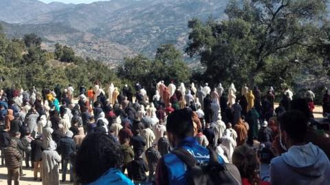 Mourners at the funeral of Rayan