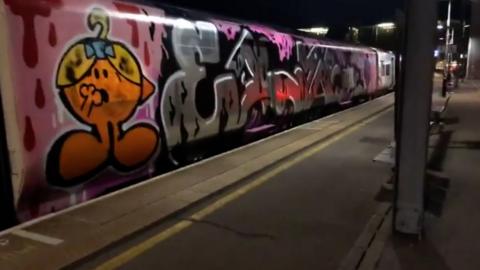 Train with graffiti on