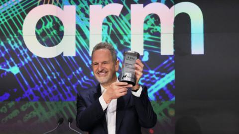Arm Holdings CEO Rene Haas poses with the Opening Bell Crystal at the Nasdaq MarketSite on September 14, 2023 in New York City.