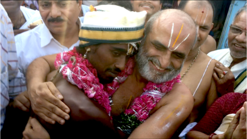 Mr Rangaran and Aditya are seen embracing.