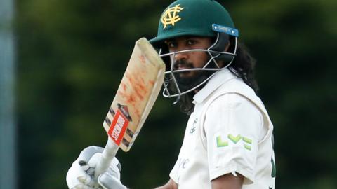 Nottinghamshire batsman Haseeb Hameed celebrates reaching his half-century against Derbyshire