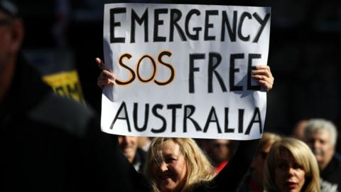 Image shows a protester in Sydney