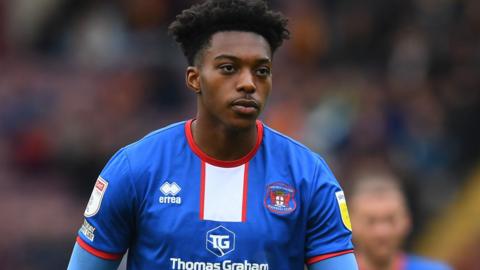 Tyrese Omotoye in action for Carlisle United