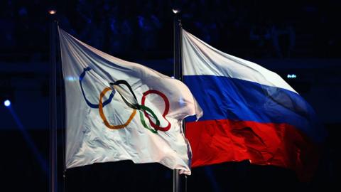 Olympic flag and Russia flag