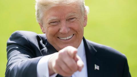 President Donald Trump speaks to the media before departing the White House on 25 October 2017