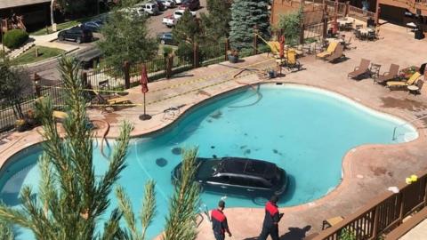 A car sitting in the bottom of a swimming pool in Colorado Springs - 3 July 2017