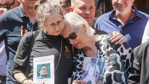 Cressida Haughton (left) whose father Derek and Deborah Dennis whose husband Barrie, died, outside Central Hall in Westminster, London, after the publication of the Infected Blood Inquiry report