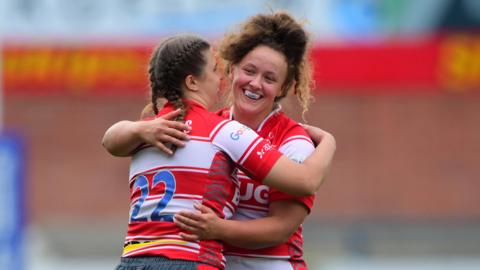 Gloucester players celebrate their win over Bristol in the Premier 15s semi final