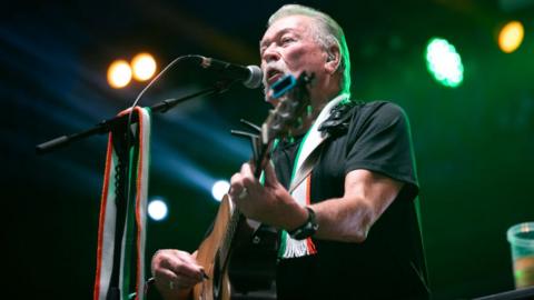 Tommy Byrne of The Wolfe Tones performing in west Belfast