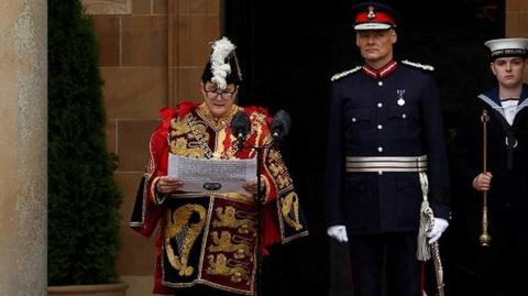 Norroy and Ulster King of Arms, Robert Noel, arrives to read the Proclamation of Accession at Hillsborough Castle,