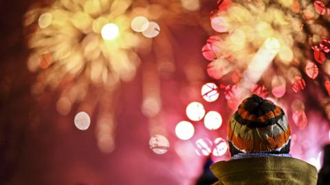 child watching fireworks display