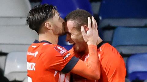 Harry Cornick (L) celebrates his equaliser with Luton team-mate Carlton Morris