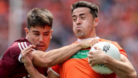 Galway's Sean Kelly tackles Armagh forward Stefan Campbell in last year's All-Ireland SFC quarter-final